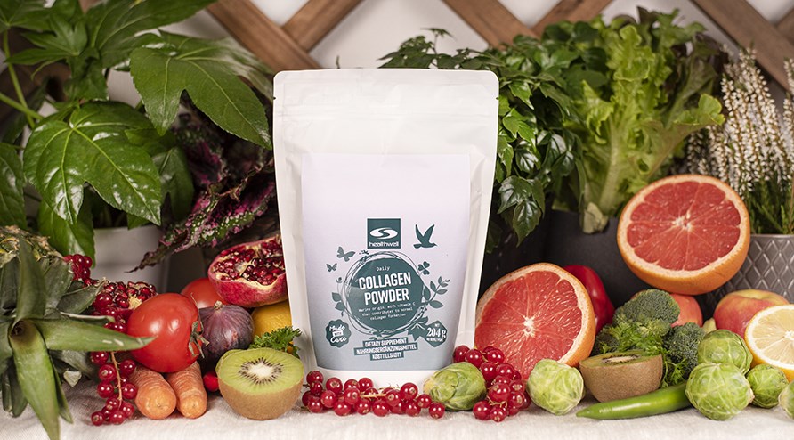 Collagen pulver p ett bord med frukt och grnt.